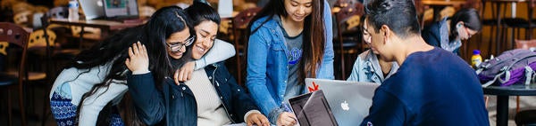 students at a table (c) UCR